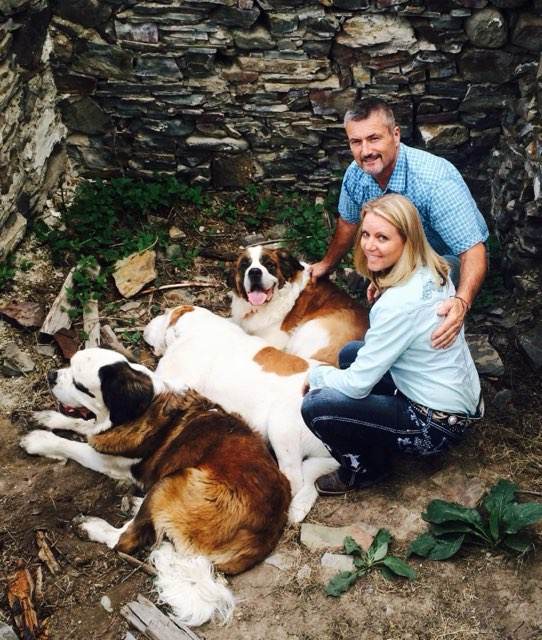 Dr. Jerry and Vicki Oler with their Saint Bernards